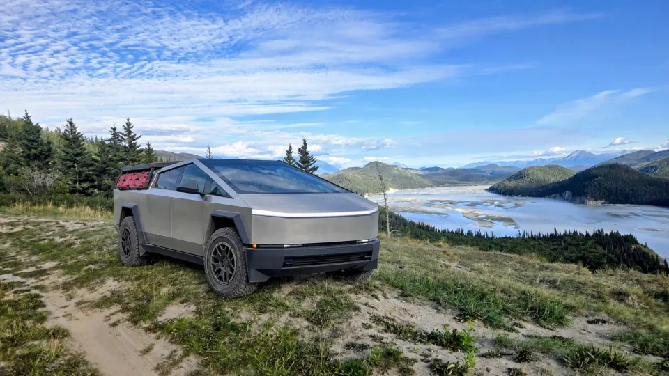 A Tesla Cybertruck with recovery boards on McCarthy Road in Alaska