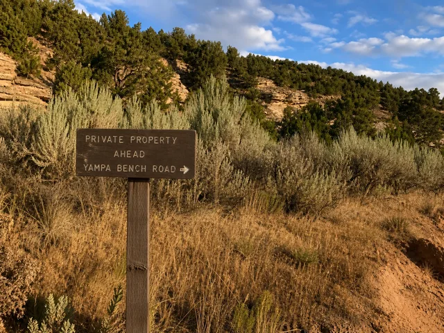 the Mantle Ranch Road sign on Yampa Bench Road in Dinosaur National Monument.