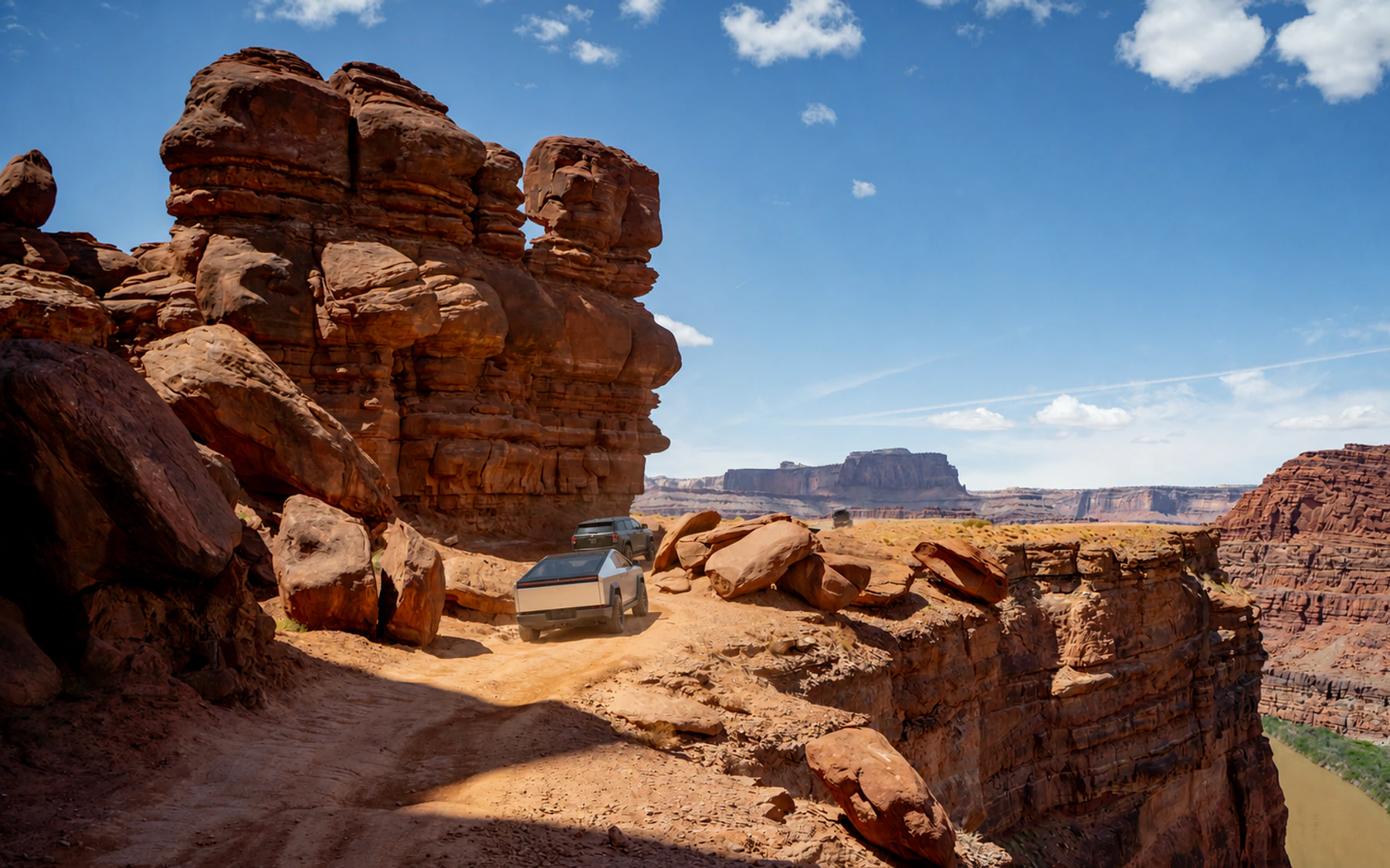 Electric trucks on the Chicken Corners route above the Colorado River