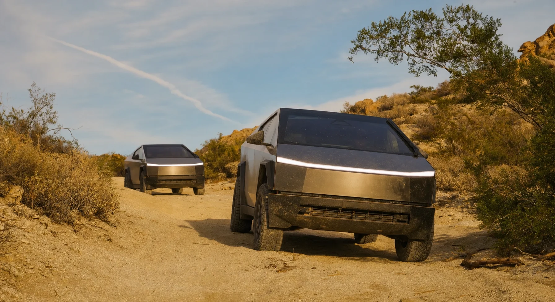 A vehicle crossing the open Mojave Road landscape