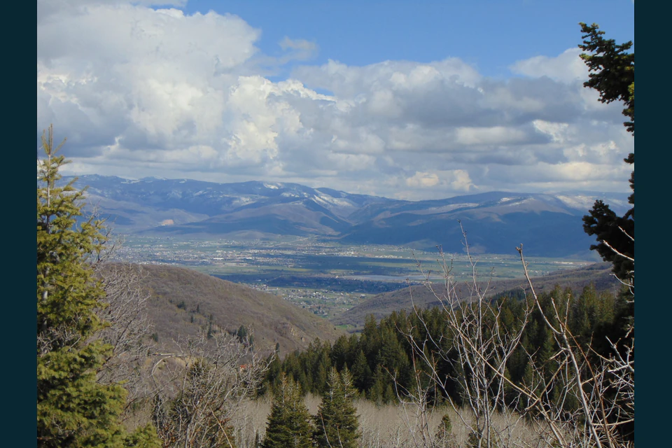 Heber Valley spread below forested Wasatch slopes from Snake Creek Road.