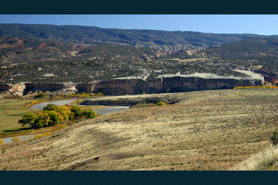 The Green River winding through Dinosaur National Monument with Cliff Ridge on the far horizon.